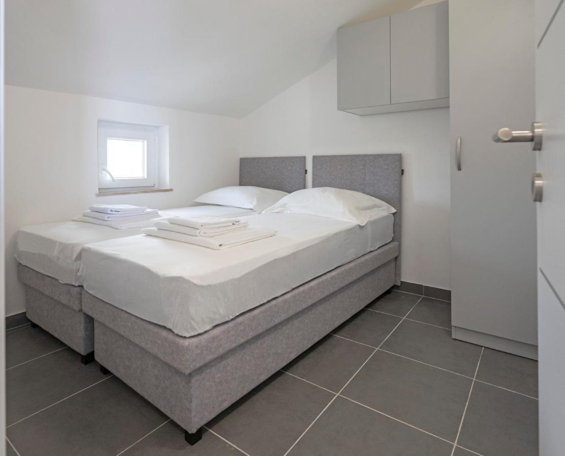 Apartmani Lovren Novaglia Esterno foto