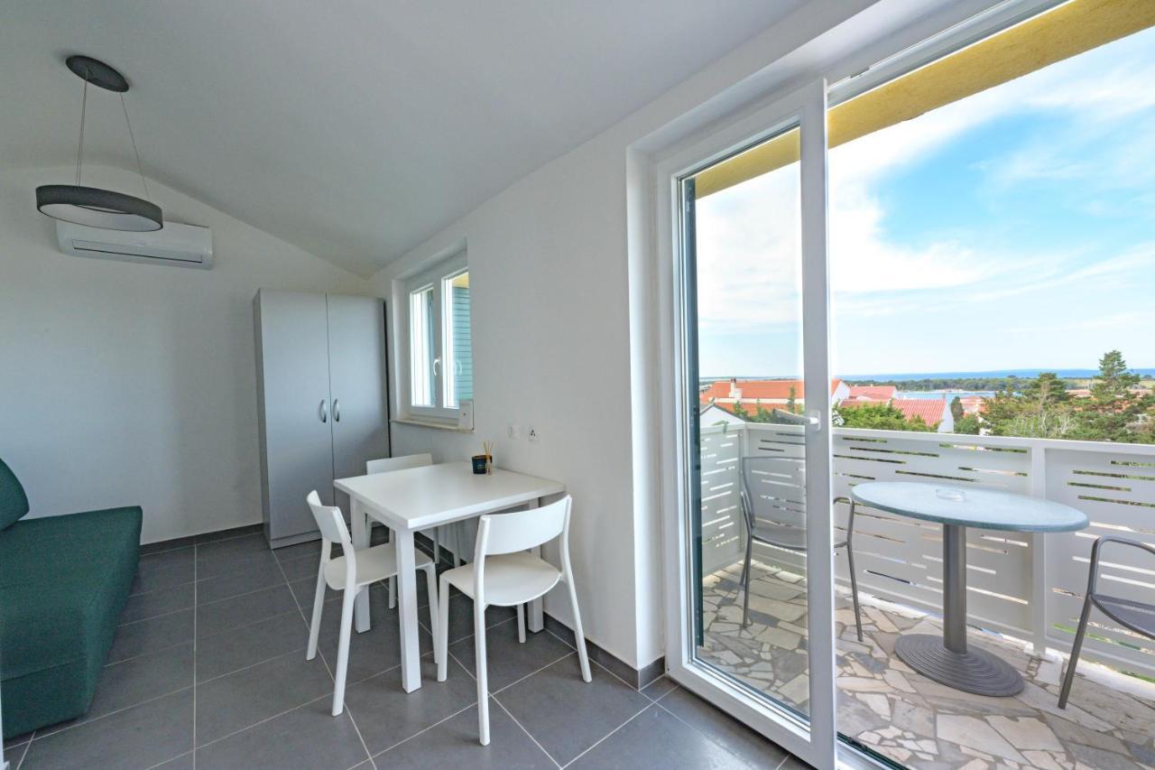 Apartmani Lovren Novaglia Esterno foto