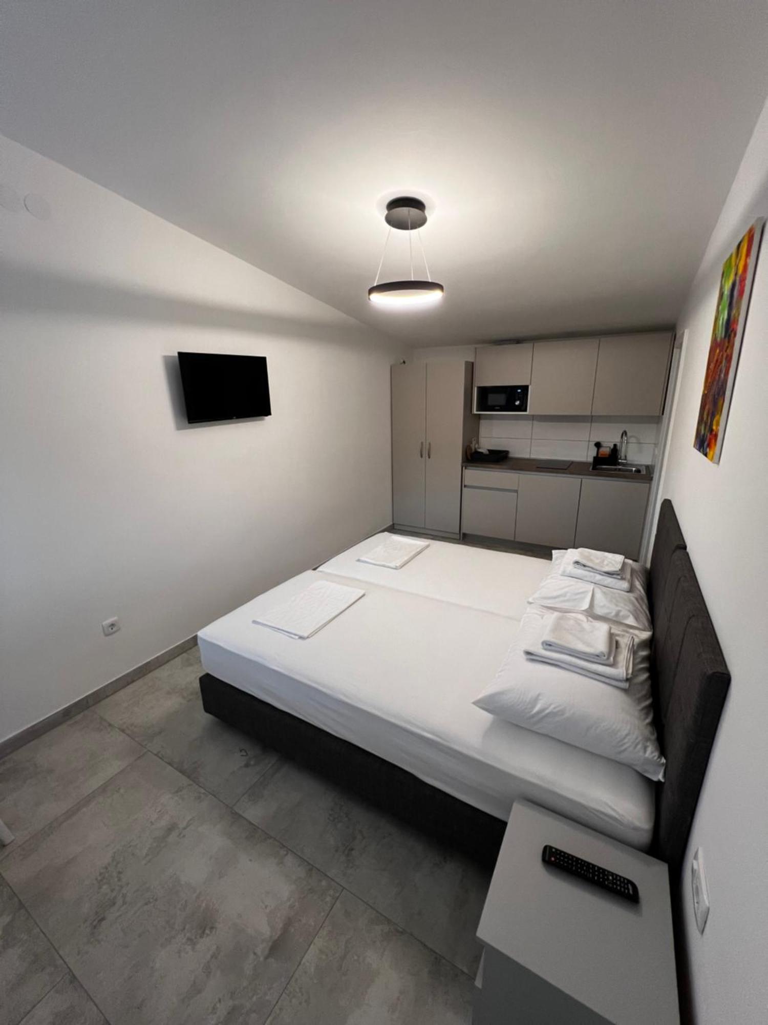 Apartmani Lovren Novaglia Esterno foto